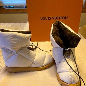 White Louis Vuitton “Pillow Comfort Boots.”